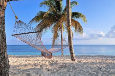 363629-hammock-on-the-beach-in-the-resort-of-guardalavaca-cuba_0.jpg